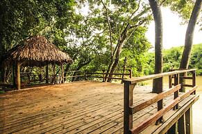 Cohune Palms River Cabanas