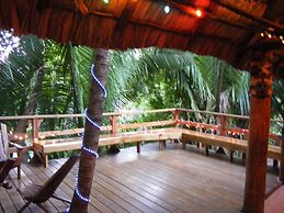 Cohune Palms River Cabanas