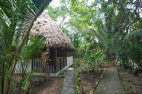 Cohune Palms River Cabanas