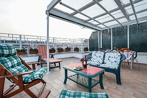 Enjoy the Sunset on Your Vatican Terrace