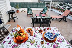 Enjoy the Sunset on Your Vatican Terrace