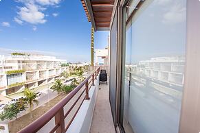 Fun and Relaxing  2BR PH steps away from the beach by Happy Address