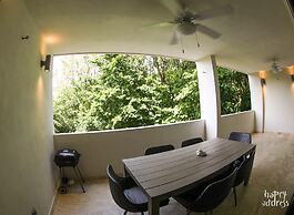 Luxurious 2BR Condo surrounded by nature by Happy Address