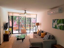 Chic Jungle 2 BR Condo by Happy Address