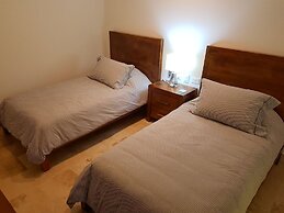 Chic Jungle 2 BR Condo by Happy Address