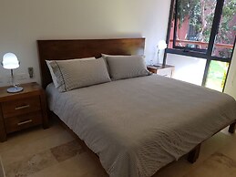 Chic Jungle 2 BR Condo by Happy Address