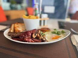 Cycad Palm Hotel