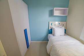 Cozy Apartment at Parahyangan Residence with Direct Access to Swimming