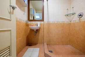 Simply Spacious Studio Room at City Home Apartment near Kelapa Gading