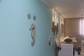 Pé na areia do Guarujá - Praia do Tombo (12F)