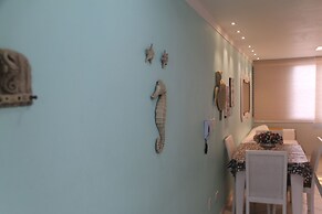 Pé na areia do Guarujá - Praia do Tombo (12F)