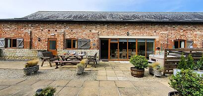 The Victorian Barn self catering holidays with pool & hot tubs