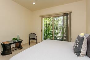 Condo Complex with an Alluring Pool & Tropical Vibes by Stella Rentals