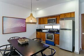 Condo Complex with an Alluring Pool & Tropical Vibes by Stella Rentals