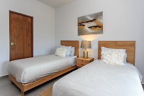 Condo Complex with an Alluring Pool & Tropical Vibes by Stella Rentals