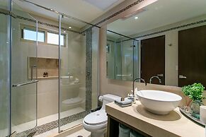 Condo Complex with an Alluring Pool & Tropical Vibes by Stella Rentals