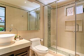 Condo Complex with an Alluring Pool & Tropical Vibes by Stella Rentals