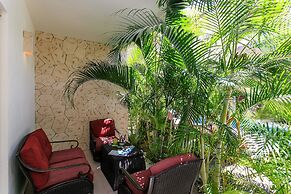 Condo Complex with an Alluring Pool & Tropical Vibes by Stella Rentals