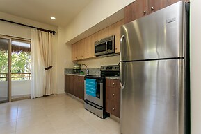 Condo Complex with an Alluring Pool & Tropical Vibes by Stella Rentals