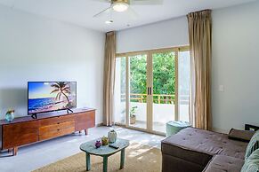 Condo Complex with an Alluring Pool & Tropical Vibes by Stella Rentals