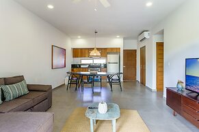 Condo Complex with an Alluring Pool & Tropical Vibes by Stella Rentals