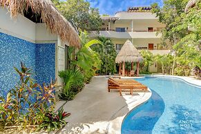 Condo Complex with an Alluring Pool & Tropical Vibes by Stella Rentals