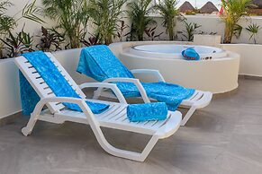 Condo Complex with an Alluring Pool & Tropical Vibes by Stella Rentals