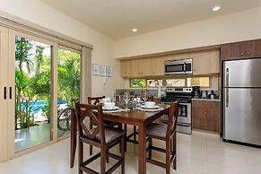 Condo Complex with an Alluring Pool & Tropical Vibes by Stella Rentals