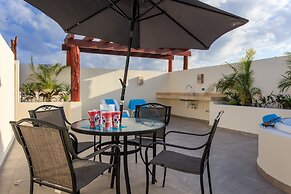 Condo Complex with an Alluring Pool & Tropical Vibes by Stella Rentals