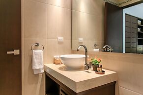 Condo Complex with an Alluring Pool & Tropical Vibes by Stella Rentals