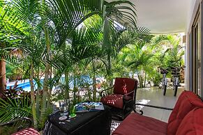 Condo Complex with an Alluring Pool & Tropical Vibes by Stella Rentals