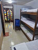 Flat na Praia de Itapuã no Térreo com AR-Condicionado - SEM TAXAS