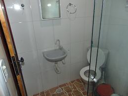 Flat na Praia de Itapuã no Térreo com AR-Condicionado - SEM TAXAS