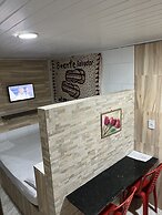 Flat na Praia de Itapuã no Térreo com AR-Condicionado - SEM TAXAS