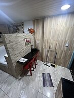 Flat na Praia de Itapuã no Térreo com AR-Condicionado - SEM TAXAS