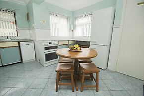 Dean Court Bungalow Parking by Brighton Holiday Lets