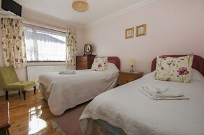 Dean Court Bungalow Parking by Brighton Holiday Lets