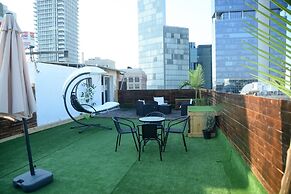 Rooftop Apartment Overlooking Rothschild