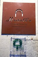 Muralha Charm House