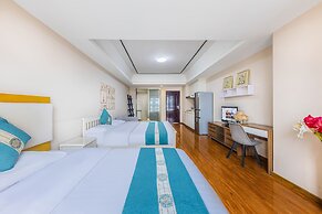 Home Inn Huayi Apartment