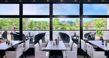 MINAMISENRI Crystal Hotel