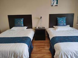 Tiandi Huadian Apartment Boya