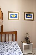 Apto 22E ar condicionado e ventilador, 2 quartos, churrasqueira, eleva