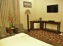 Raj One Hotel