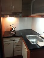 Apartment The Suites Metro by Herlan