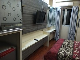 Apartment The Suites Metro by Herlan