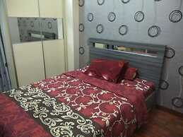 Apartment The Suites Metro by Herlan