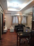 Apartment The Suites Metro by Herlan