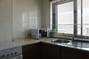 Super City Residence & Apartments