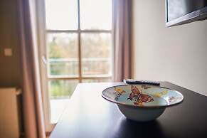 Peacock Boutique Apartments